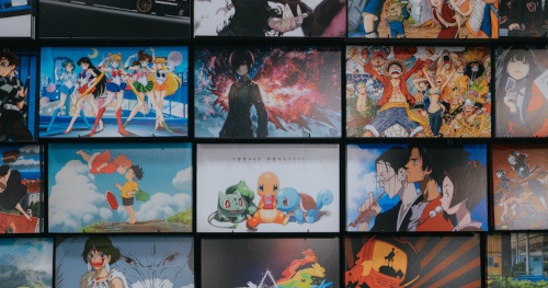 Grid wall display of anime poster panels
